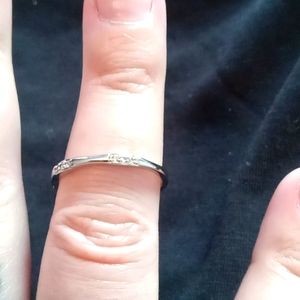 Minimalist ring size 8,has 3 sets of 3 rhinestones on top, nwot